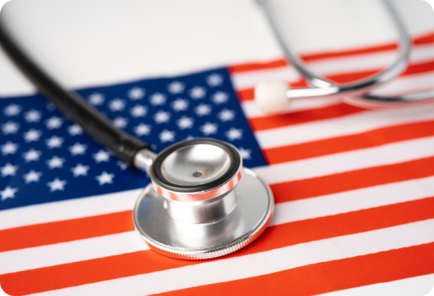 Stethoscope on American flag symbolizing immigration medical exam requirements at True Family Clinic in Pearland